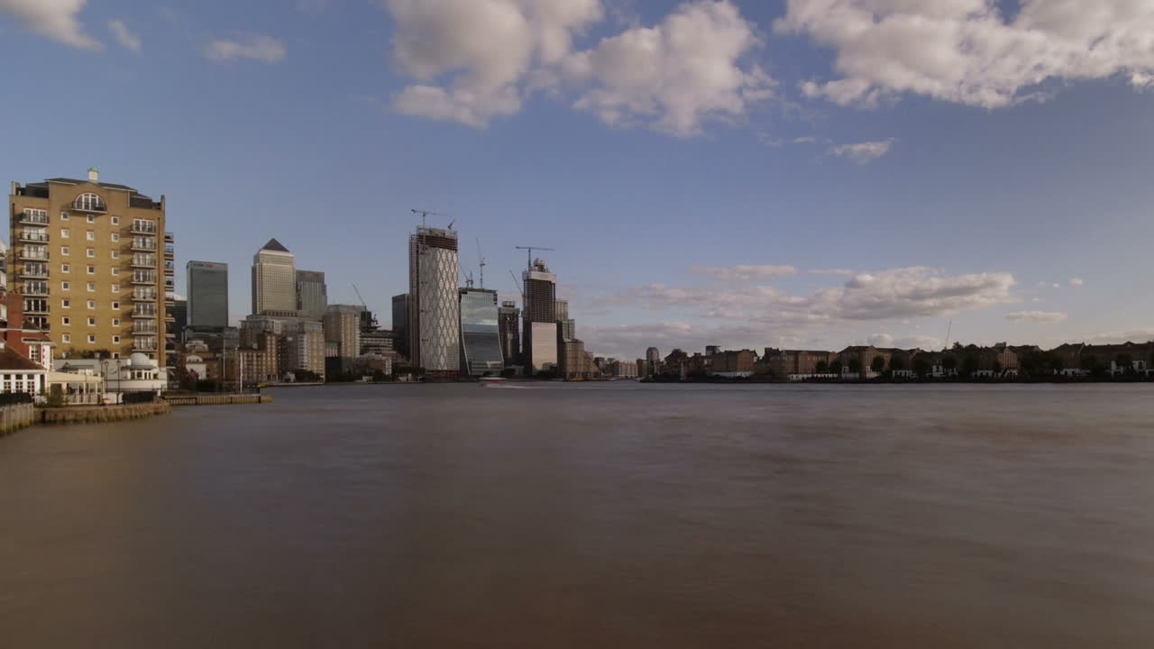 Time Lapse of River Thames Boat Traffic, Canary Wharf, Docklands, Isle of Dogs, London, UK