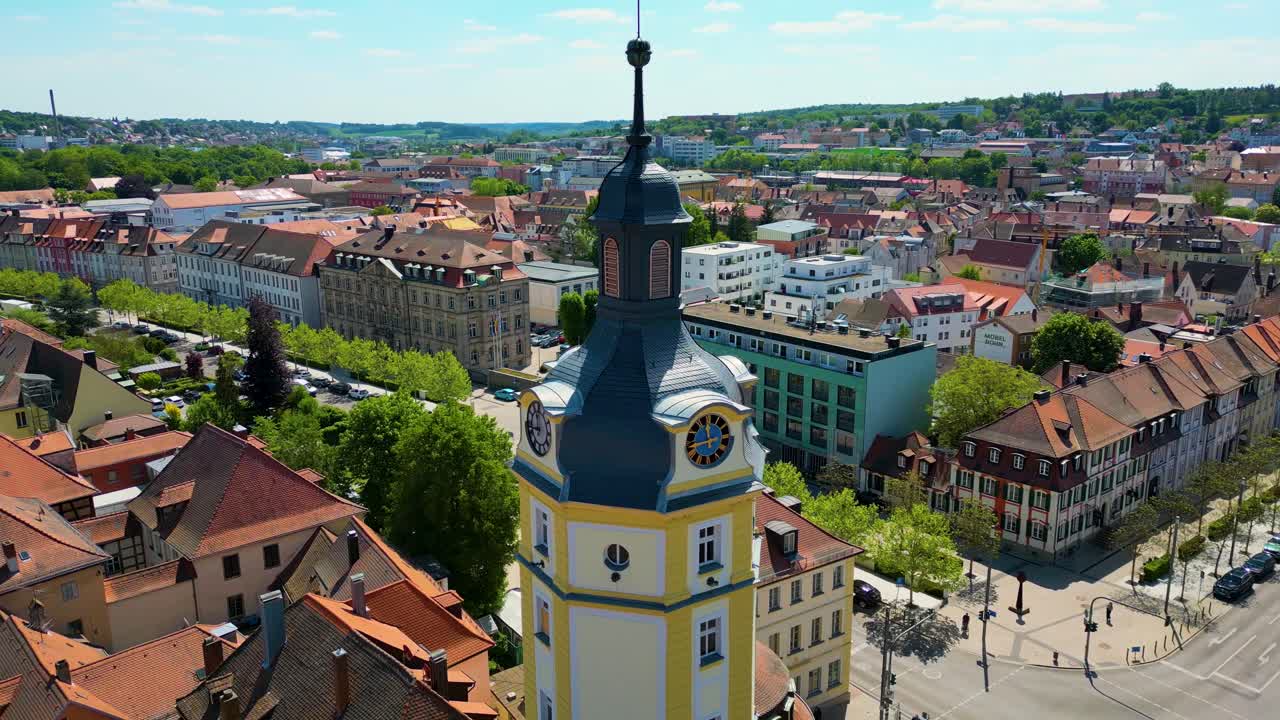 4K Aerial Drone Video of the Historic Herrieder Clock Tower in the Old Town area of Downtown Ansbach, Germany