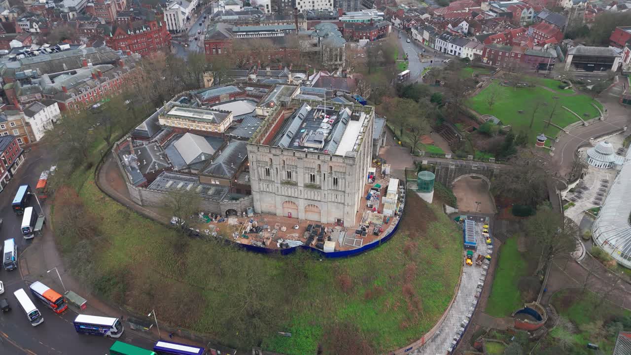 Norwich castle, norfolk, with nearby churches, streets, and shops, aerial view
