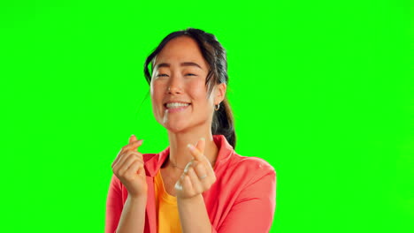 Feliz,-Mostrando-Y-Cara-De-Mujer-Asiática-En-Un-Verde