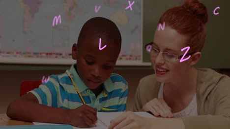 Animation-of-floating-pink-letters-over-boy-and-teacher-sitting-in-classroom-writing