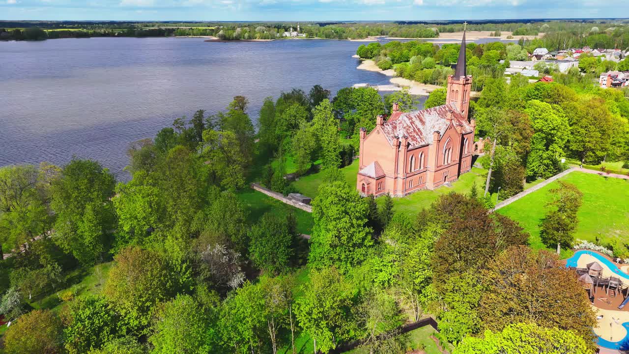 Red Brick Evangelical Reformed Church In Birzai, Lithuania. Aerial Drone Shot