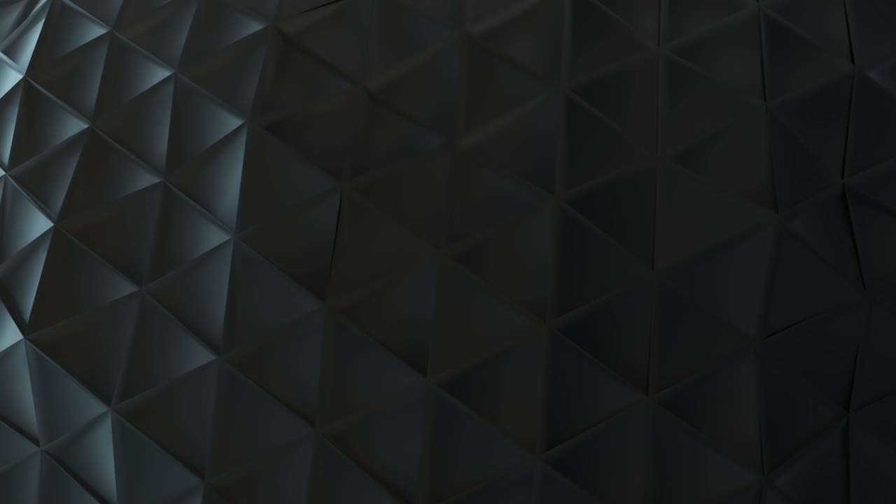 абстрактная черная пластиковая поверхность, сделанная из соединенных треугольников.