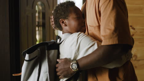 Boy-Hugging-His-Father-And-Then-Leaving-Home