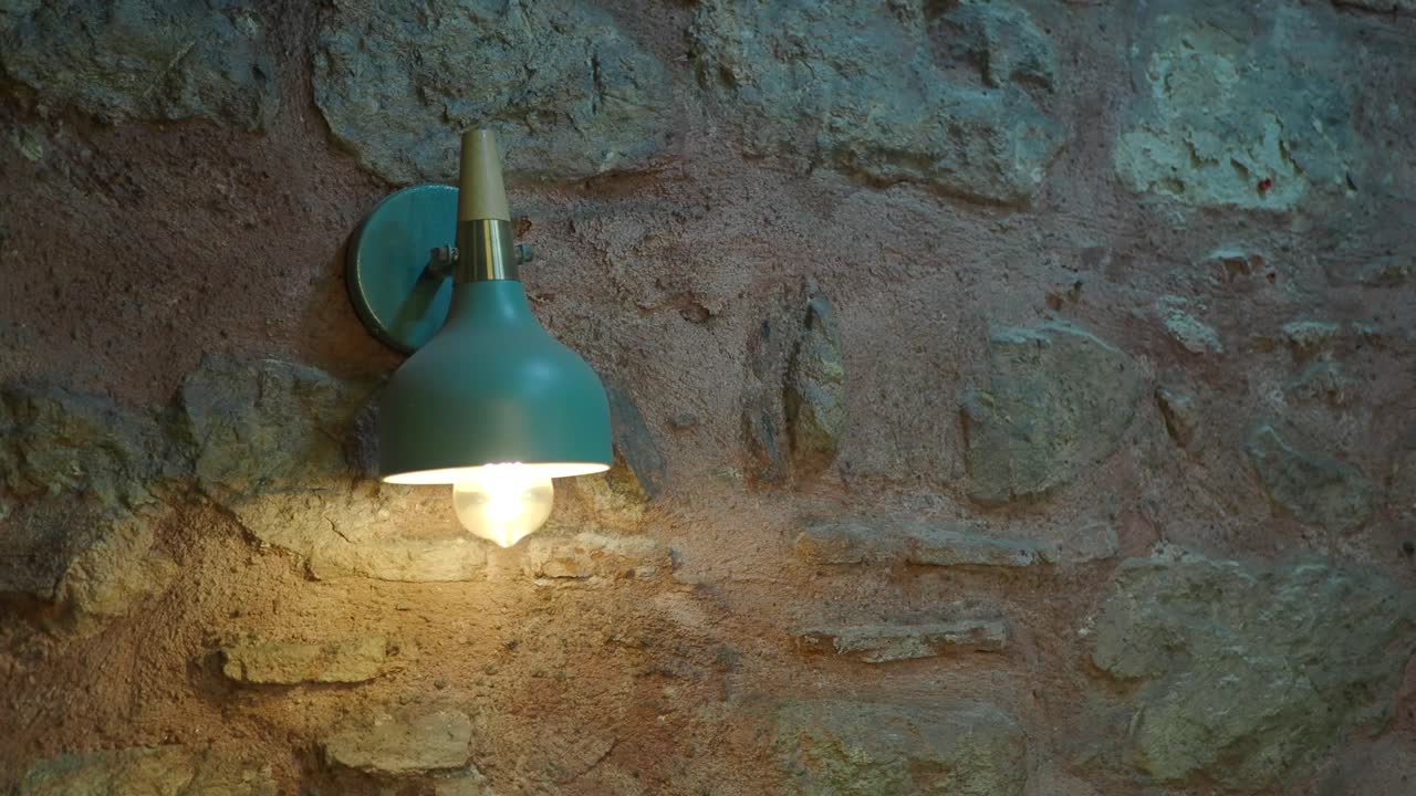 Wall lamp on a stone wall