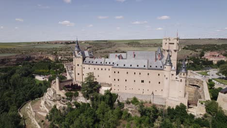 Fairytale-castle-fortress-of-Alcazar-de-Segovia-establishing-circle-pan-aerial