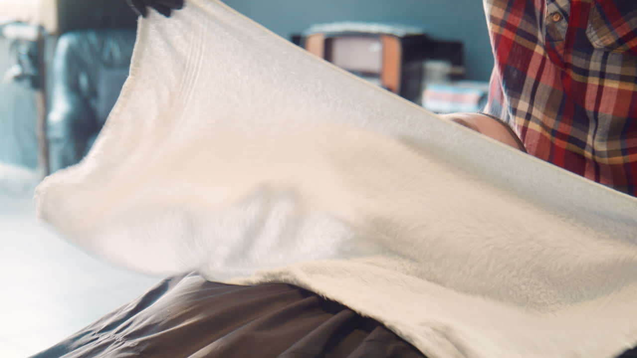 Man Getting a Shaving Treatment at a Barber Shop