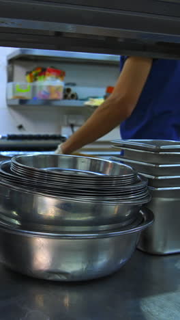 commercial kitchen equipment and food prep area