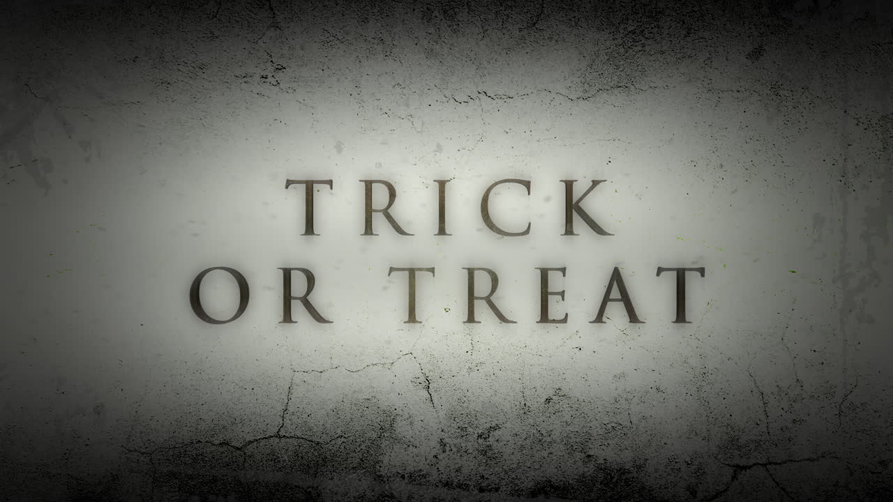 truco o trato en la pared del grunge blanco oscuro