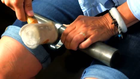 craftswoman preparing ring