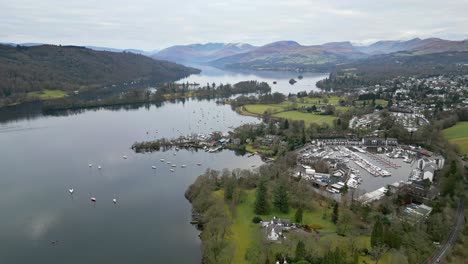 cinematic aerial view over the village of windermere in the lake district