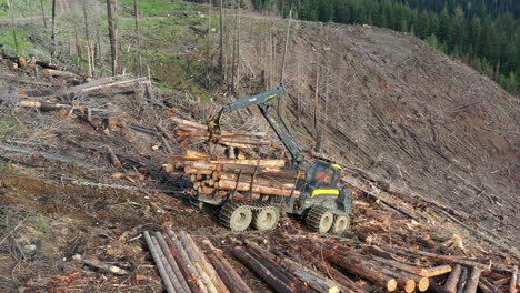 Heavy-Machinery:-Overhead-Shot-of-Forwarder-on-Mountain-Trail