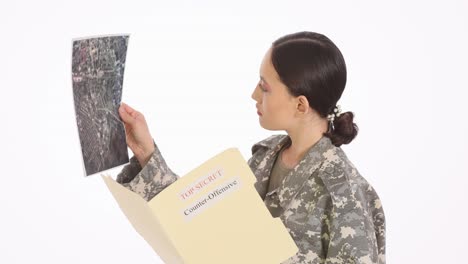 soldier reviews top secret counter-offensive documents
