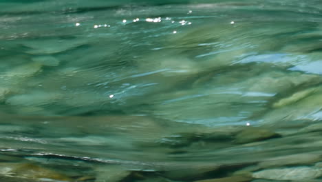 clear, fresh river water flowing - isolated close up texture layer