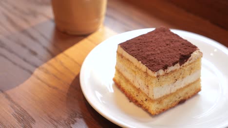 tiramisu cake and latte