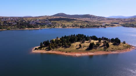 aerial view of the lion island on lake jindabyne near snowy mountains in new south wales, australia