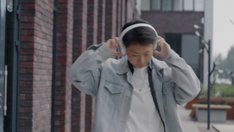young person dancing in the city
