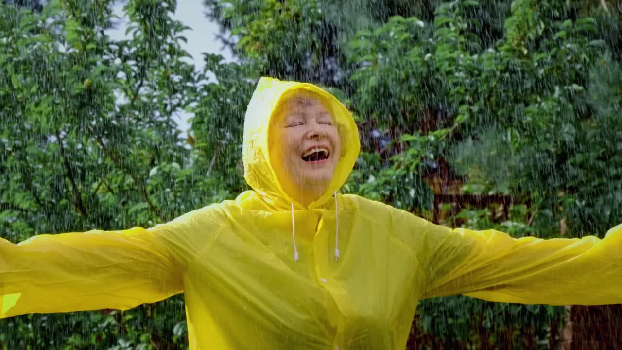 Senior Woman Enjoying a Rainy Day