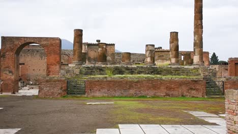 ruins of famous pompeii city, italy.temple of aesculapius or jupiter meilichios