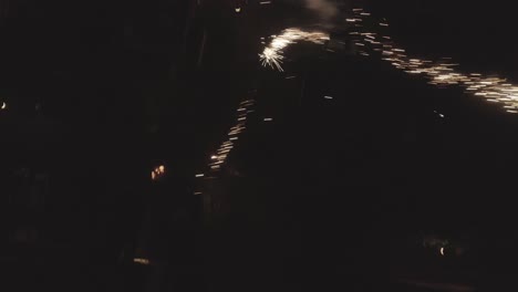 Shot-of-new-years-fireworks-coming-right-at-the-camera-drone