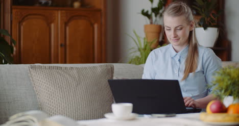 Home-Office-Concept-Woman-Typing-On-Laptop-Keyboard-2