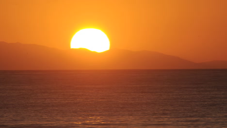 time lapse of the sun setting over the pacific ocean and behind santa cruz island from ventura california