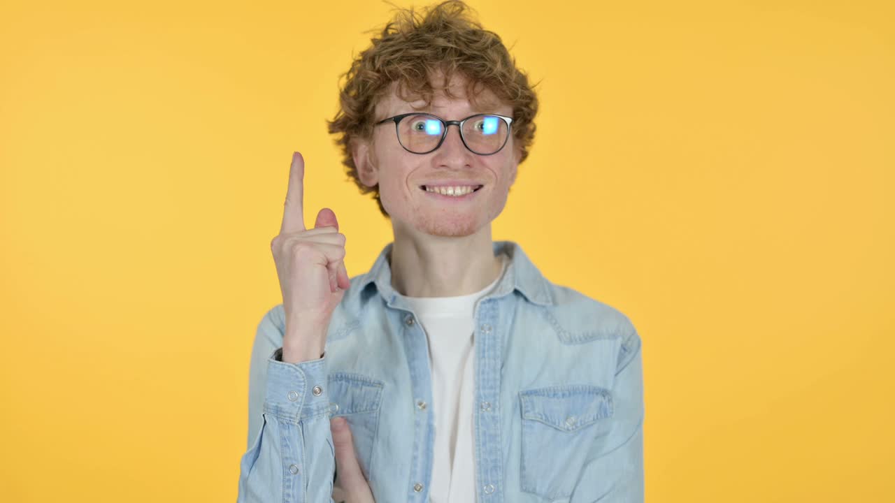 Redhead Young Man Thinking Getting Idea, Yellow Background