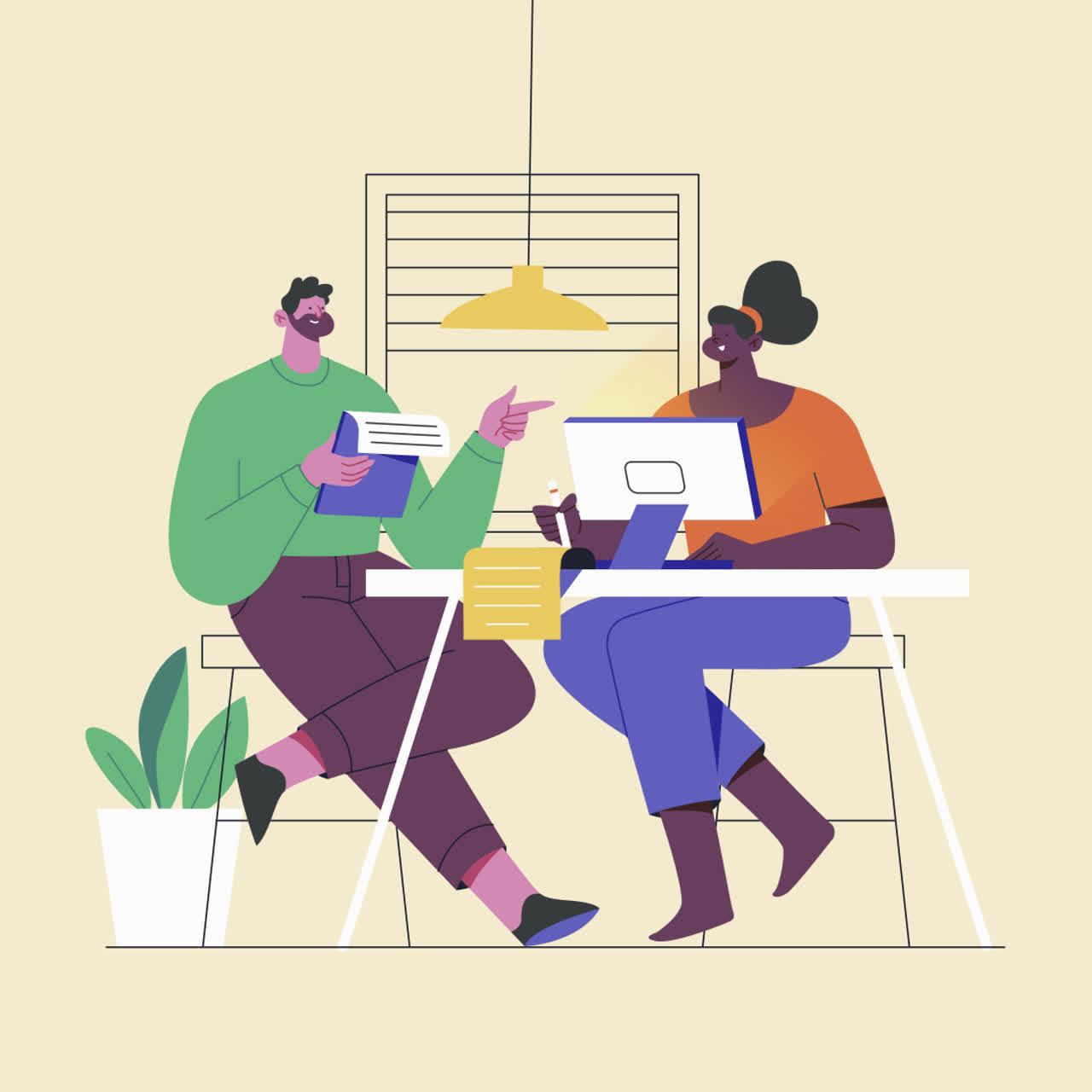 Two people collaborating at a desk