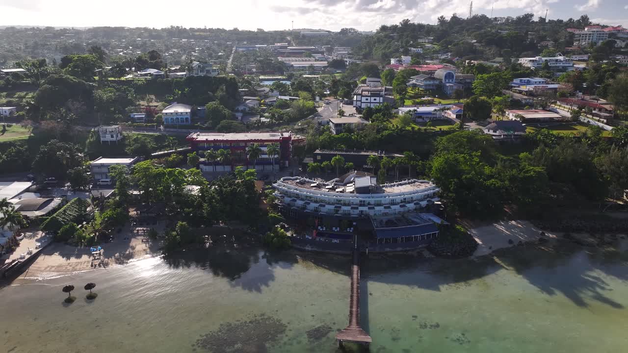 Port Vila, Vanuatu. Waterfront with hotel buildings and cityscape during sunset. Pacific Island