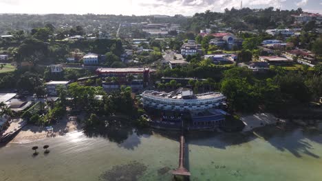 port vila, vanuatu. waterfront with hotel buildings and cityscape during sunset. pacific island