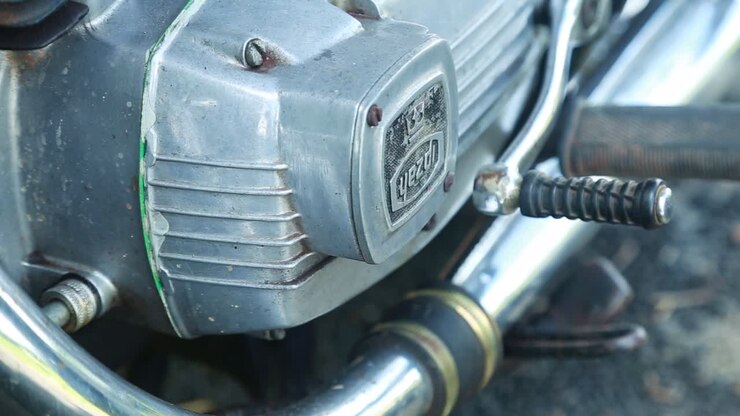 Sliding shot of old motorbike engine , Old style brake lever , Indian vintage motorcycle