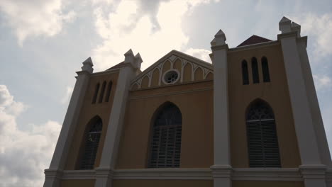 Clouds-moving-over-a-church-in-the-early-morning