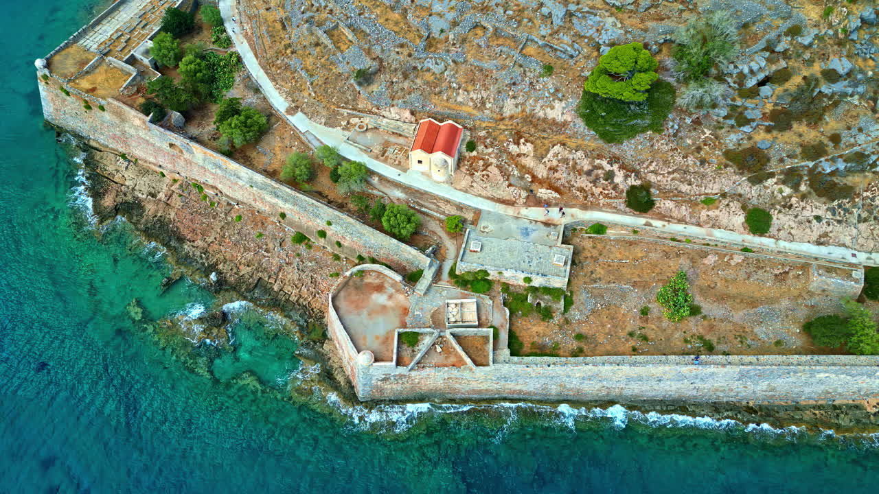 Aerial top shot of famous Spinalonga fortress situated in Schisma Eloundas, Greece.