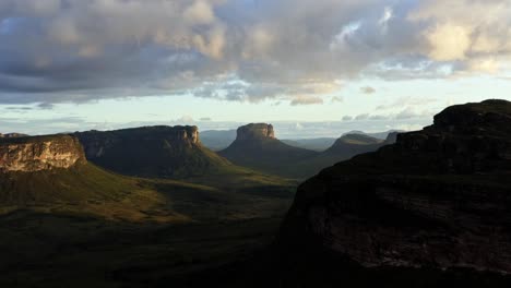 rising flying drone landscape shot of the stunning capao valley from the mount of pai inácio in the chapada diamantina national park in northern brazil on a warm sunny summer evening