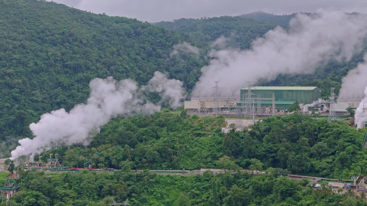 Geothermal plants emit thick smoke in volcanic mountains above Ormoc, Leyte, showing air pollution