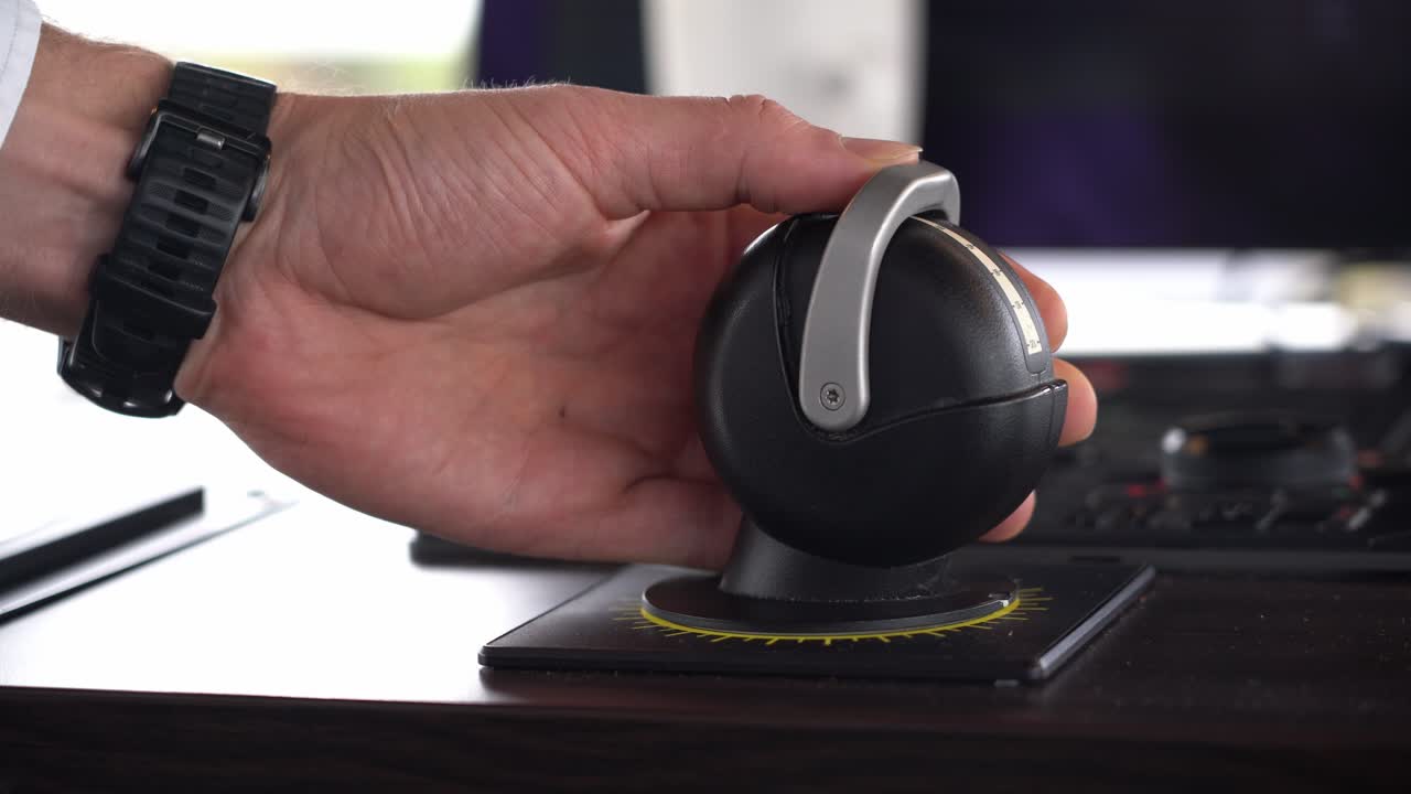 Ship captain increases ships engine thrusters to full ahead - Close up