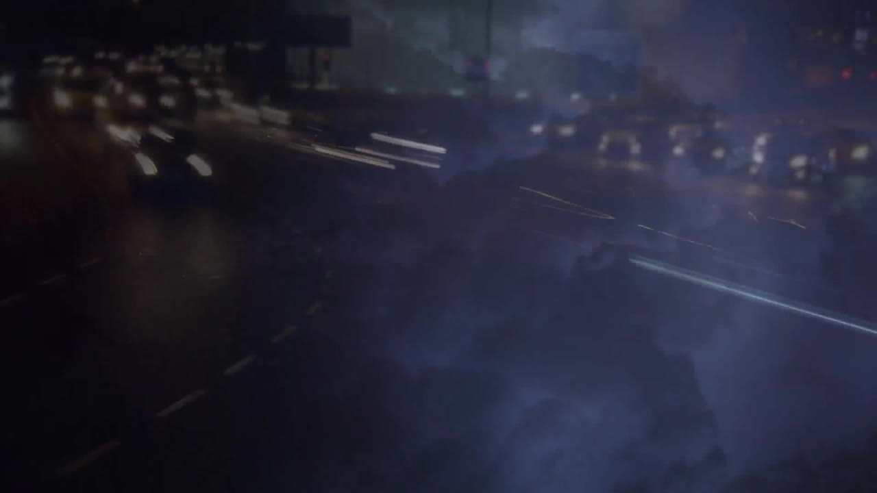 Animation of night city over storm clouds