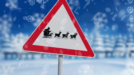 Schneeflocken-Fallen-Gegen-Den-Weihnachtsmann-Im-Schlitten,-Der-Von-Rentieren-Auf-Einem-Stoppschild-Gezogen-Wird