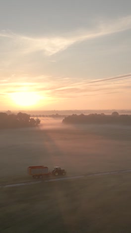 sunrise over a foggy farmland