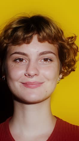 portrait of a smiling woman with curly hair