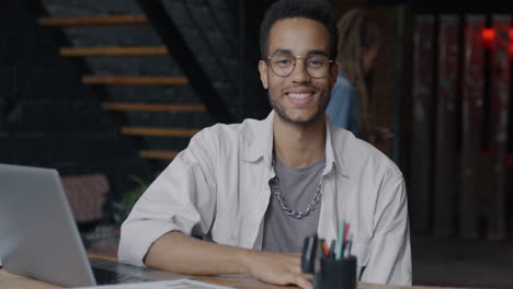 happy young professional at work