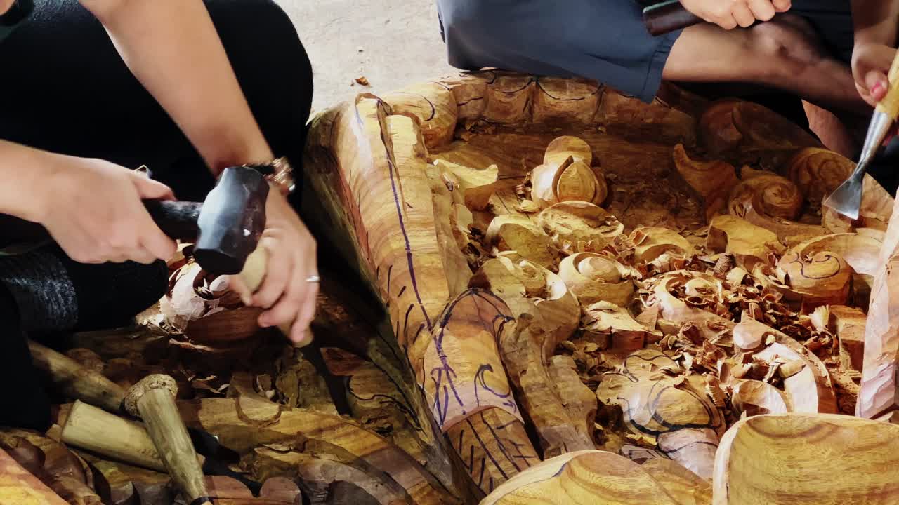 Intricate Wood Carving: Artisans at Work