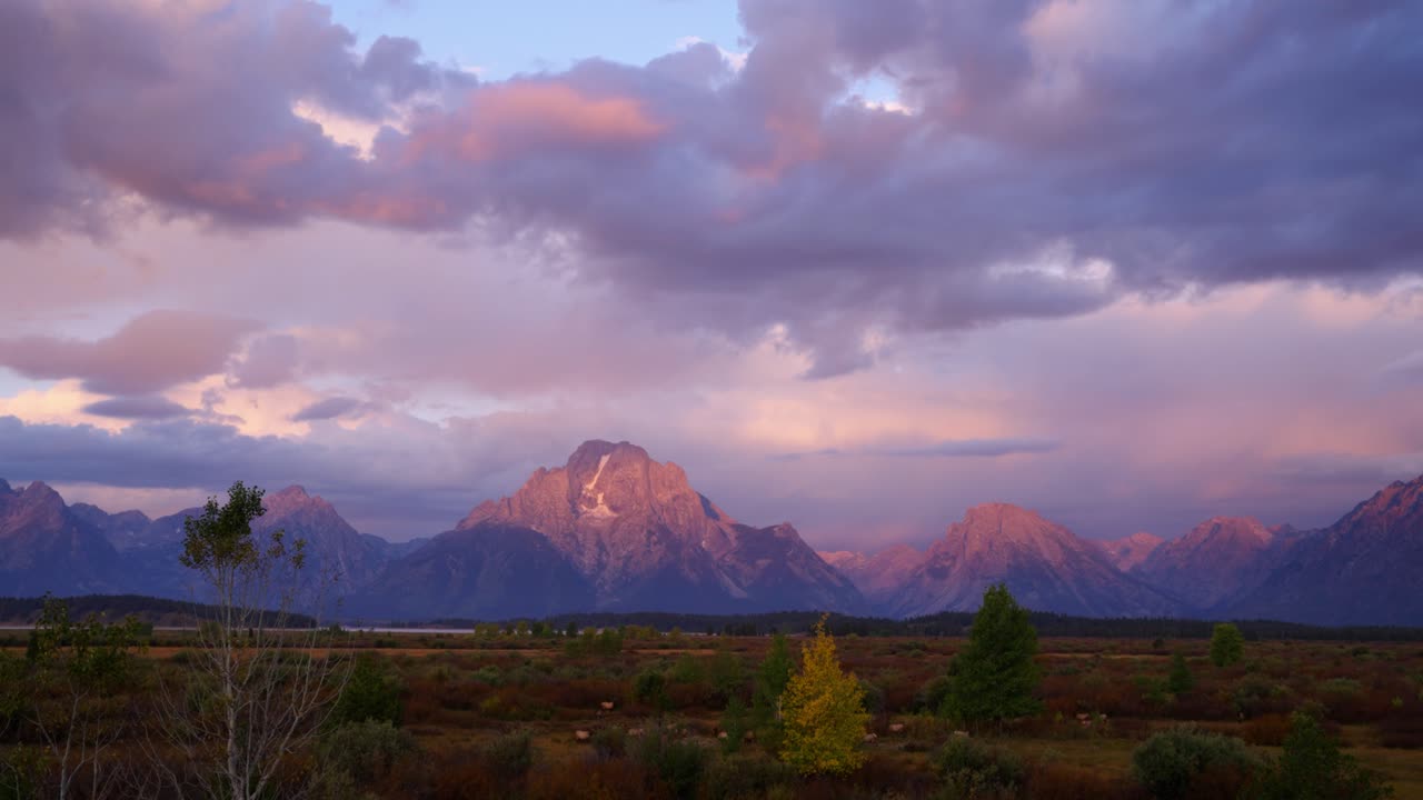 Pink sunrise time lapse over Mt. Moran in Grand Teton National Park, Wyoming