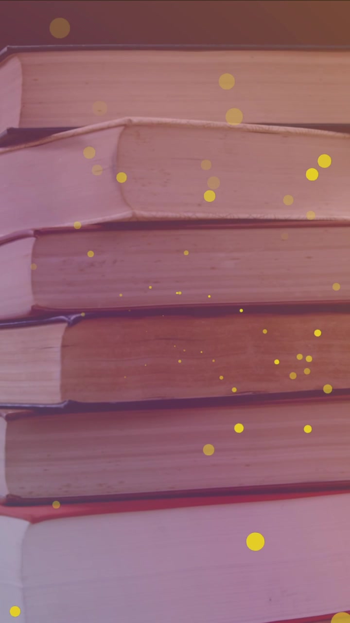 Animazione di macchie gialle su libri su sfondo nero
