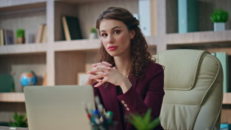 successful businesswoman posing workplace closeup. attractive young executive