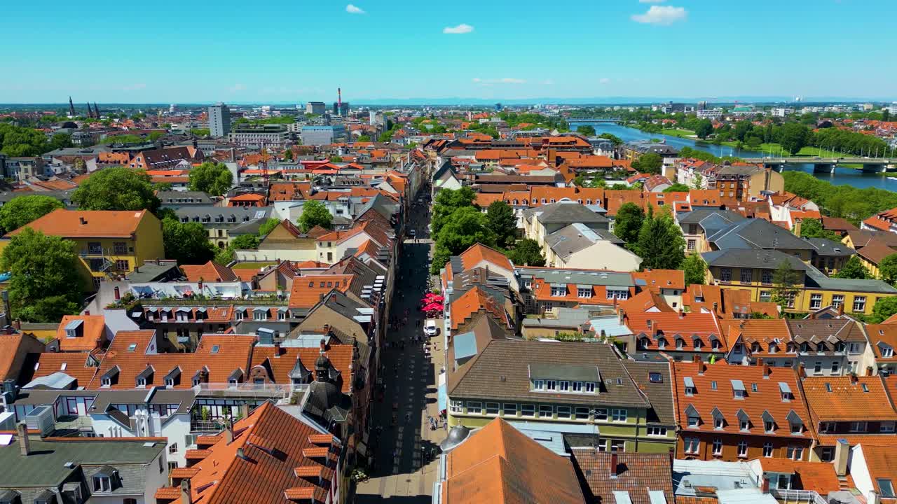 4K Aerial Drone Video of Historic Homes, Shops, and Churches along the Neckar River in Downtown Heidelberg, Germany