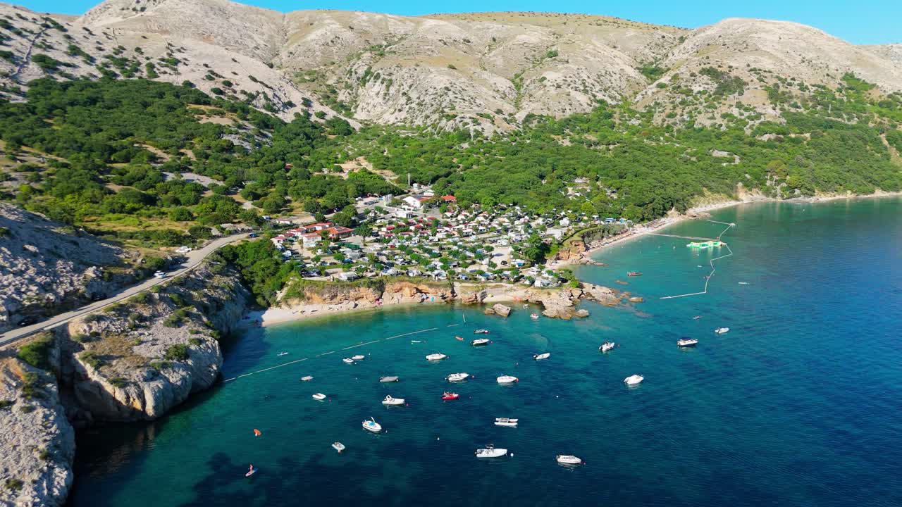 Campsite at Campig Skrila, Krk Island, Stara Baska Croatia, Aerial View of the Mountains and Coast With Boats, Beaches and Adriatic Sea. The Seaside Rv Campmobiles on a Summer Beautiful Coastline