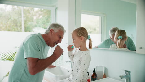 Grandfather,-child-and-brushing-teeth