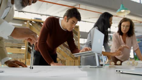 executives working at table in the office 4k