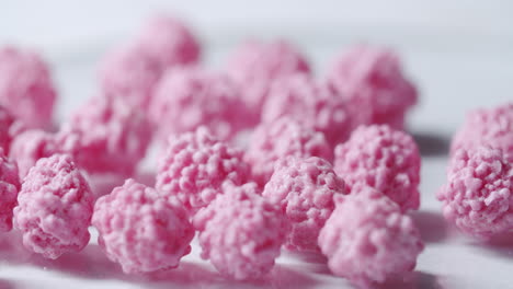 close up shot of pink particles with shallow depth of field